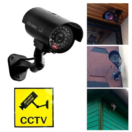 Realistic Dummy Security Camera with Blinking LED for Home Protection mounted on exterior wall with red LED and CCTV warning sign