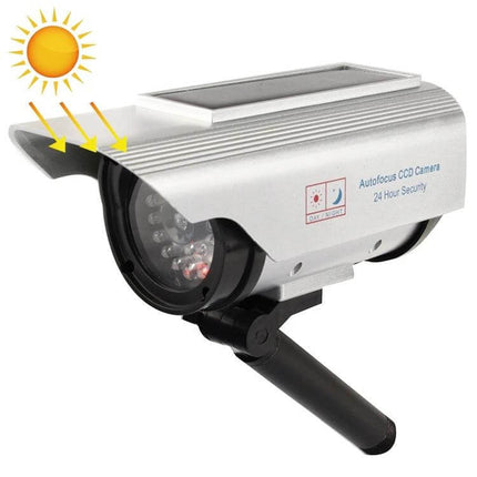 Solar Powered Dummy Camera with Flashing LED for Home Security mounted outdoors with solar panel and flashing LED deterrent