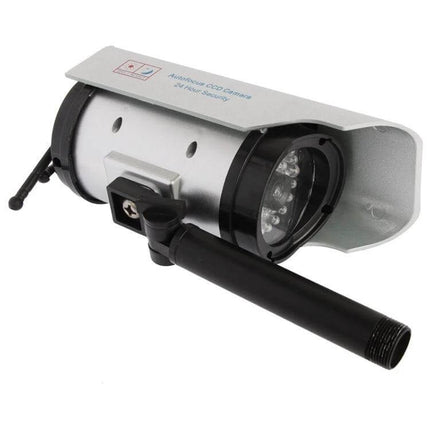 Solar Powered Dummy Camera with Flashing LED for Home Security showing silver faux CCTV housing with LED ring and black antenna
