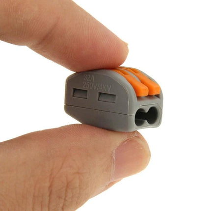 Pack of 10 Universal 2-Pin Solderless Wire Connectors for Easy Home Wiring - compact grey 2-pin lever connector held between fingers