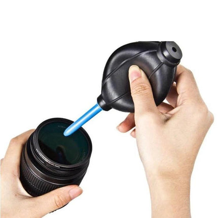 Practical 3-in-1 Cleaning Kit for Camera Lens Maintenance and Care — air blower removing dust from lens, silicone tool for safe optical cleaning