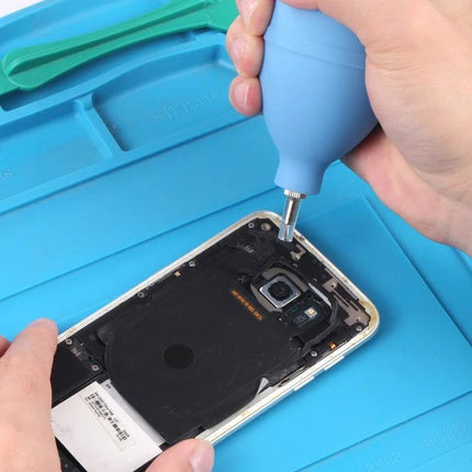 Mini Rubber Air Dust Blower for Electronics Cleaning gently removing dust from inside a smartphone during repair