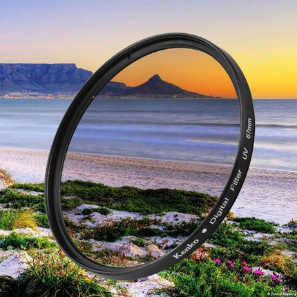 67mm UV Camera Lens Filter for Protection Against UV Rays and Dust shown against a coastal landscape, protecting lens from UV, haze, dust and scratches