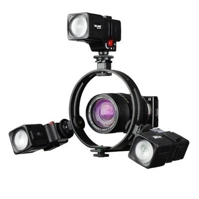O-Shaped Mounting Bracket for Camcorder Video Lights securely holding three LED flash lights around a camcorder lens for interview and vlog lighting