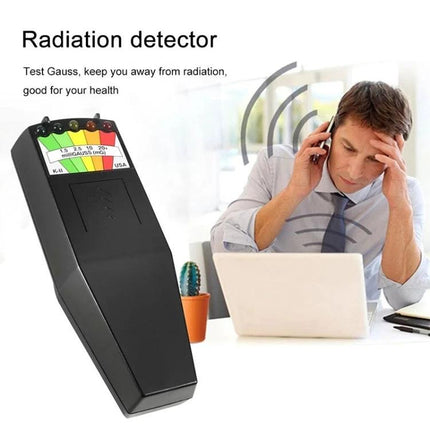 Portable 5-LED Electromagnetic Radiation Detector for Home Monitoring handheld EMF meter with five LED indicators showing levels near laptop and phone
