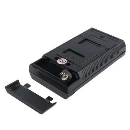 Electromagnetic Radiation Detector for Home Environment Monitoring black handheld unit with open battery compartment and 9V connector