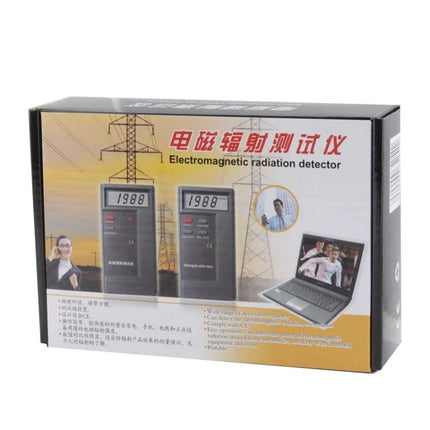 Electromagnetic Radiation Detector for Home Environment Monitoring handheld device box showing digital readings and laptop