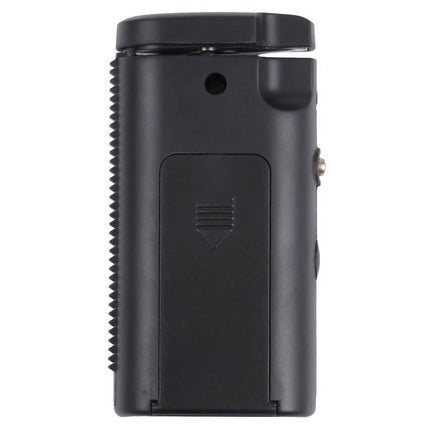 Digital LCD Battery Tester for Common Household Types compact black handheld tester with LCD display and battery compartment