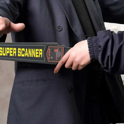 Hand-Held Metal Detector for Security Screening and Crowd Control being used to scan a person during event security crowd control