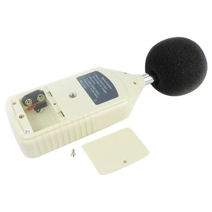 Digital Sound Level Meter for Everyday Noise Monitoring — handheld meter with foam windscreen and open battery compartment
