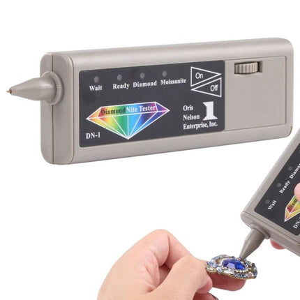 Portable Moissanite and Diamond Tester with US Plug handheld tester checking a sapphire ring authenticity