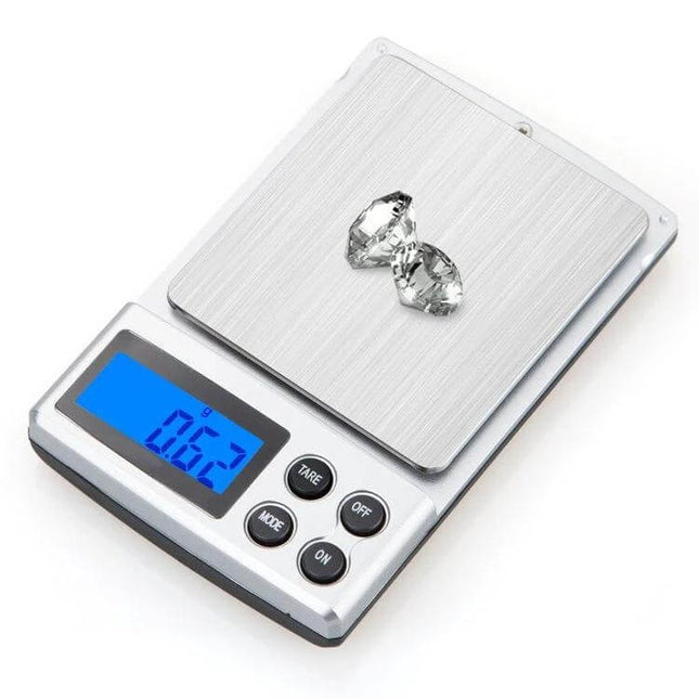 Digital Pocket Scale 300g Capacity For Precise Home Weighing showing stainless steel pan, blue backlit display reading 0.62 g and two gemstones on scale