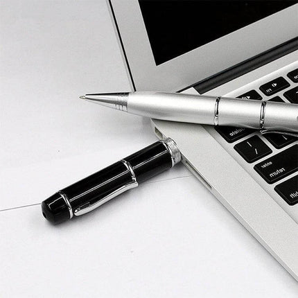 Silver Laser Pen Style USB Flash Drive with 8GB Storage - compact silver pen USB plugged into laptop for file transfer and backup