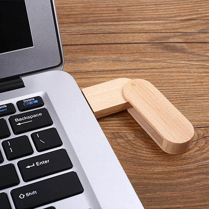 8 GB Wooden USB Flash Drive for Storing Files and Photos plugged into laptop on wooden desk, natural wood exterior, compact design
