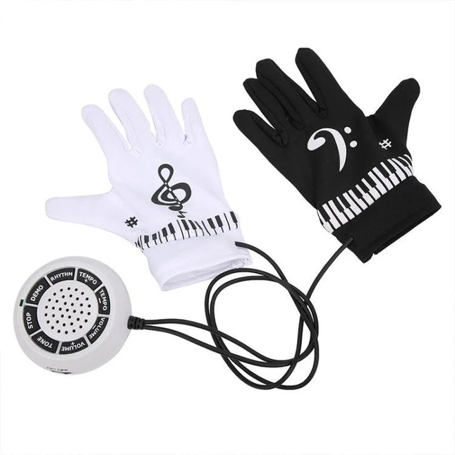 Electronic Piano Gloves for Creating Music Anywhere - black and white fingertip gloves with keyboard print and portable speaker controller