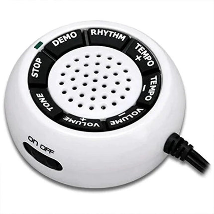 Electronic Piano Gloves for Creating Music Anywhere — white portable speaker control module with demo rhythm tempo volume tone buttons