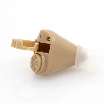 Wireless Behind-the-Ear Hearing Aid for Everyday Assistance beige in-ear device with volume control and open battery compartment