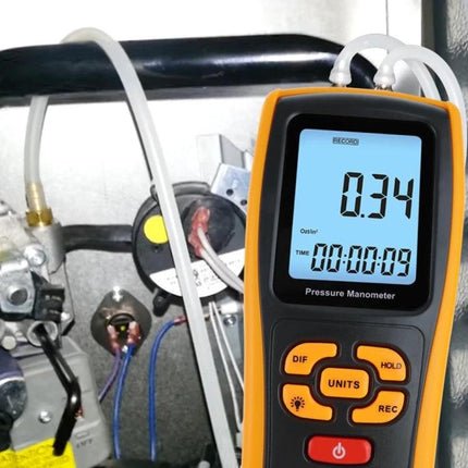 Benetech Digital Pressure Manometer for Gas and Liquid Measurement handheld unit displaying 0.34 reading during HVAC diagnostic