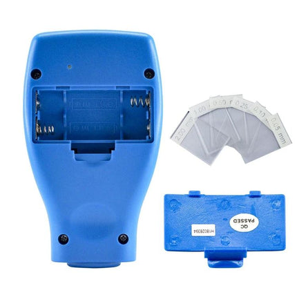 Benetech Coating Thickness Gauge for Metal Surfaces handheld blue gauge with calibration shims and battery compartment visible