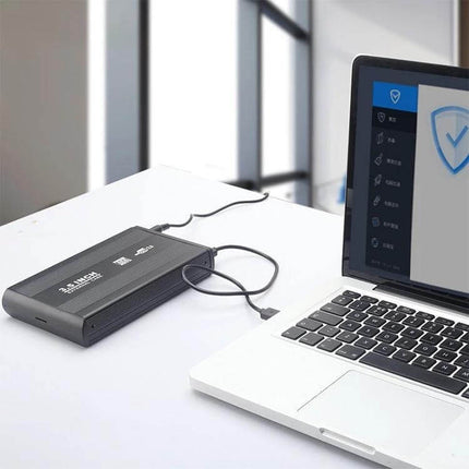 Portable USB Enclosure for 3.5 Inch Hard Drives connected to laptop for portable SATA desktop backup and file transfer