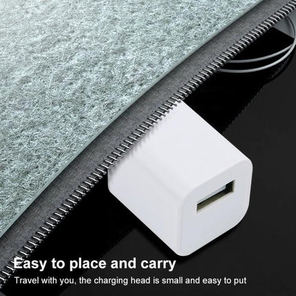 Compact USB Charger for Travel and Everyday Essentials - white compact USB wall charger tucked into a carry pouch for travel