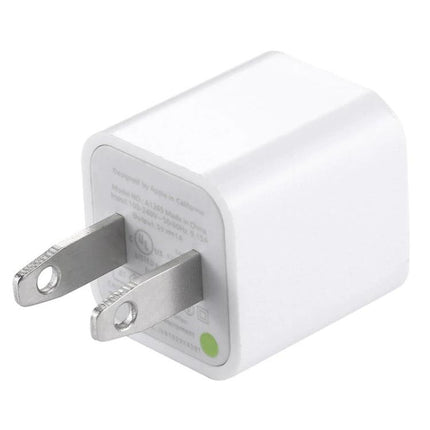 USB Charger Adapter for Daily Phone Power Needs at Home pictured compact white USB wall charger with foldable prongs