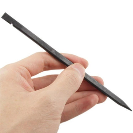 Plastic Spudger Pry Tool for Electronics Disassembly and Repair - black nylon pry tool held in hand for opening smartphones and laptops