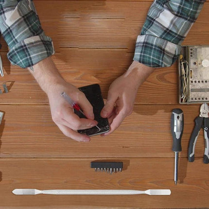 Metal Pry Tool for Phone and Tablet Disassembly, 18cm used by technician to open a smartphone during screen or battery repair