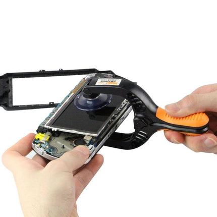 Jakemy Universal Mobile Screen Repair Tool for Smartphones being used to pry and lift a smartphone screen with a suction clamp during repair