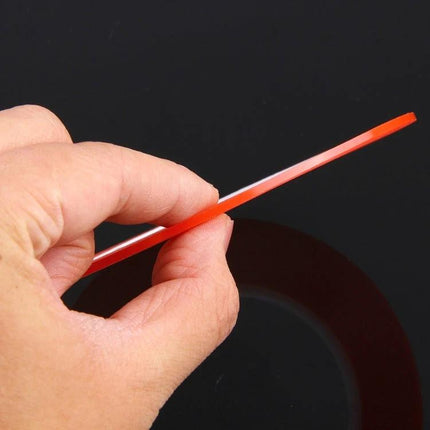 2mm Wide Double Sided Adhesive Tape for Mobile Phone Repair, 25m Length - close-up of red 2mm tape strip held between fingers for screen repair