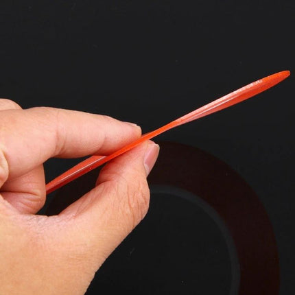 1mm Width Double-Sided Adhesive Tape for Mobile Screen Repair shown thin orange strip held between fingers for phone screen installation