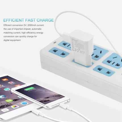 EU Plug Travel Charger Cable for Everyday Device Powering shown plugged into EU power strip charging a smartphone and tablet on the go