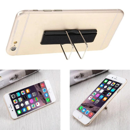 Universal Foldable Phone Stand with Finger Grip for Easy Holding shown attached to a smartphone, used as a secure grip and foldable desk stand