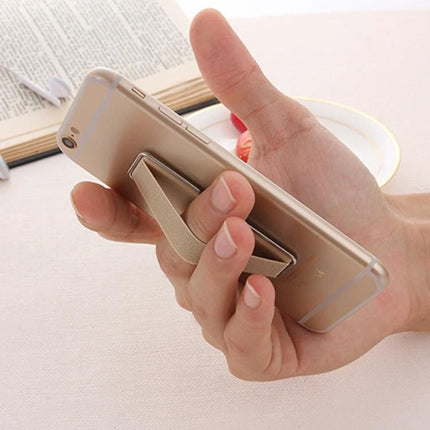Universal Foldable Phone Stand with Finger Grip for Easy Holding shown attached to a gold phone being held securely, converting to a stable tabletop stand