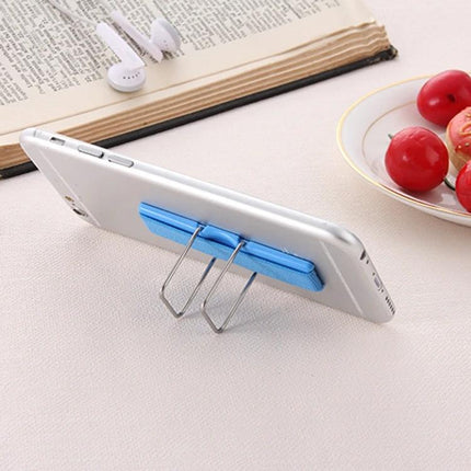 Universal Foldable Phone Stand with Finger Grip for Easy Holding - blue 2-in-1 phone grip and table stand propped on smartphone