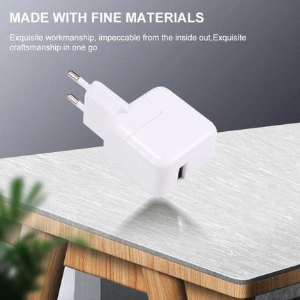 Versatile EU Plug USB Charger for Travel and Daily Use white compact USB wall charger on table
