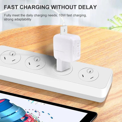 Versatile EU Plug USB Charger for Travel and Daily Use compact white USB wall charger plugged into power strip showing fast charging setup