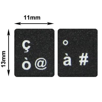 Italian Keyboard Stickers for Laptop and Desktop Computers - close-up of black stickers showing Italian letters (ç, ò, à) and symbols with size 11x13mm