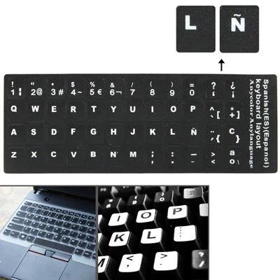Spanish Keyboard Layout Stickers for Laptops and Desktops showing black stickers with Ñ and accented character labels for laptops and desktop keyboards