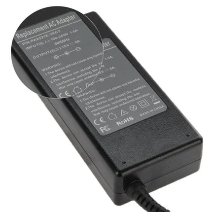 Versatile AC Adapter for Everyday Toshiba Laptop Charging - black replacement adapter with cable and safety labels