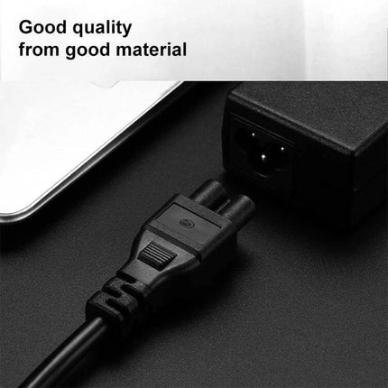 AC Adapter for ThinkPad Laptops with International Plugs showing connector plugged into adapter near laptop