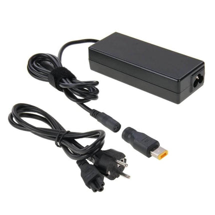 Universal Laptop Charger with Multiple Tips and EU Plug showing black adapter, EU power cord and interchangeable tips for travel
