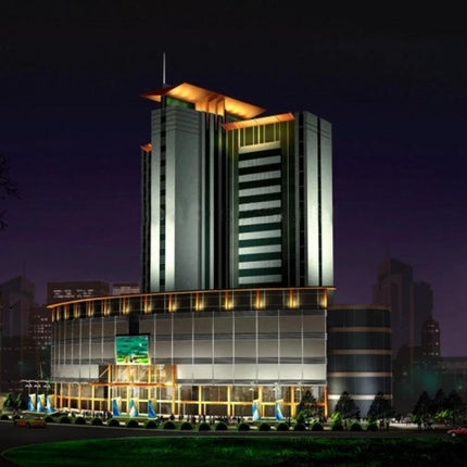 Practical LED Bulbs for Home and Everyday Lighting Needs - modern illuminated commercial building at night showing bright consistent lighting