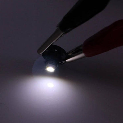White LED Instrument Dash Light Bulb for Vehicle Dashboard shown lit to improve gauge visibility and dashboard readability