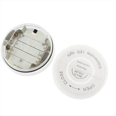 LED Light for Setting Cozy Home Moods with Remote Control - compact battery-powered color-changing puck light with removable cover and 13-color remote control