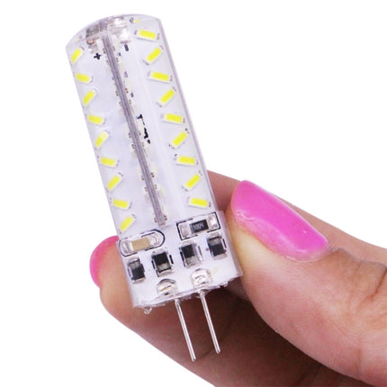 Versatile LED Light for Home, Office, and Daily Routines - compact G4 LED bulb held between fingers for task and reading illumination