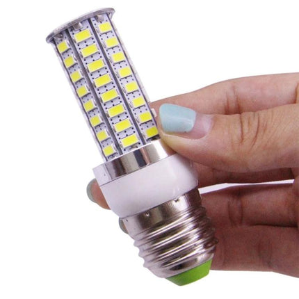 Practical LED Light for Daily Home and Office Use – compact corn-style LED bulb held between fingers for reading and desk lighting