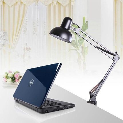 Mic Stand for Recording Sessions and Live Performances clamped to desk beside laptop for podcasting and live setups