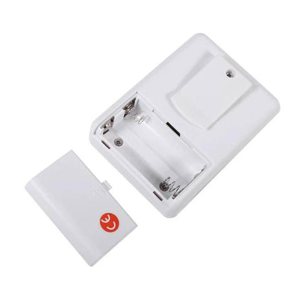 Wireless PIR Sensor Doorbell Alarm for Home and Office Security white battery compartment and cover close-up