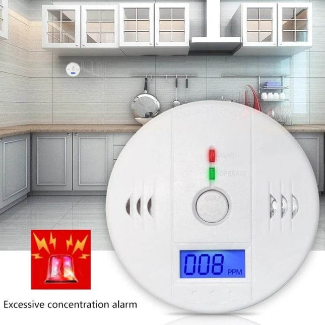 Carbon Monoxide Detector with LCD Display for Home Safety mounted in modern kitchen showing 008 PPM reading and loud alarm